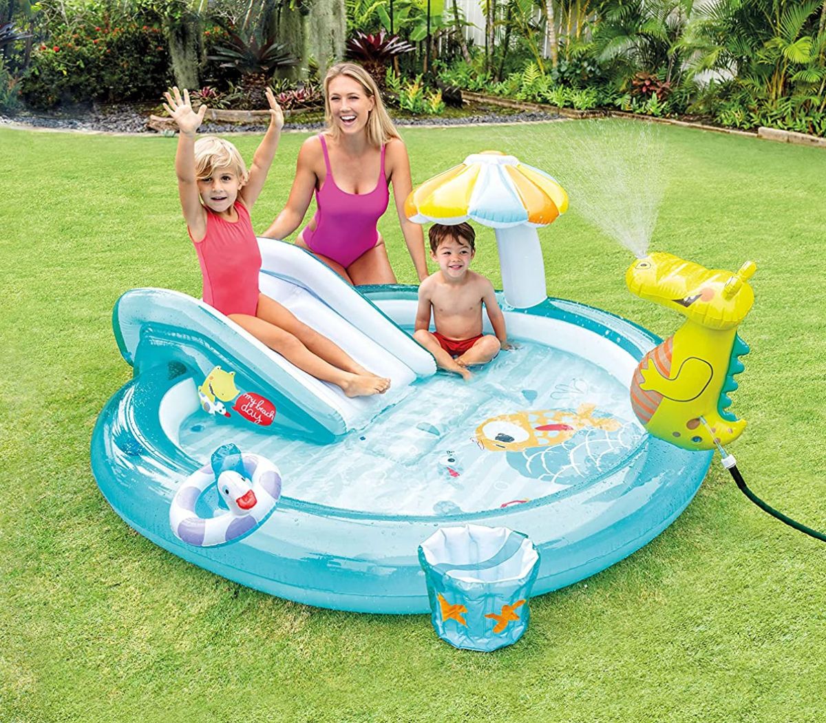 Intex Swim center family inflatable pool featuring gator with mom and two kids playing 