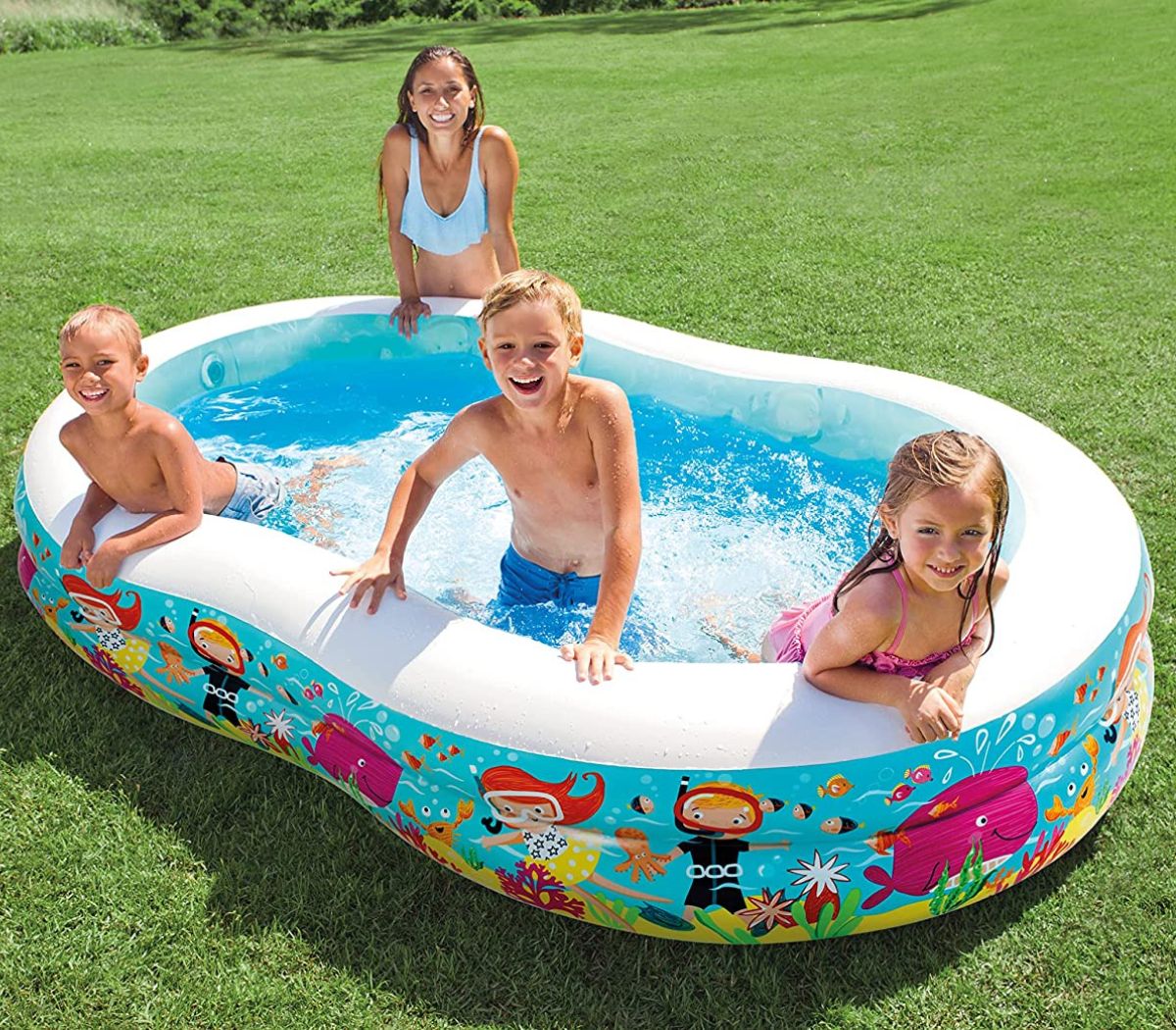 Mom with 3 kids relaxing in an oval inflatable pool