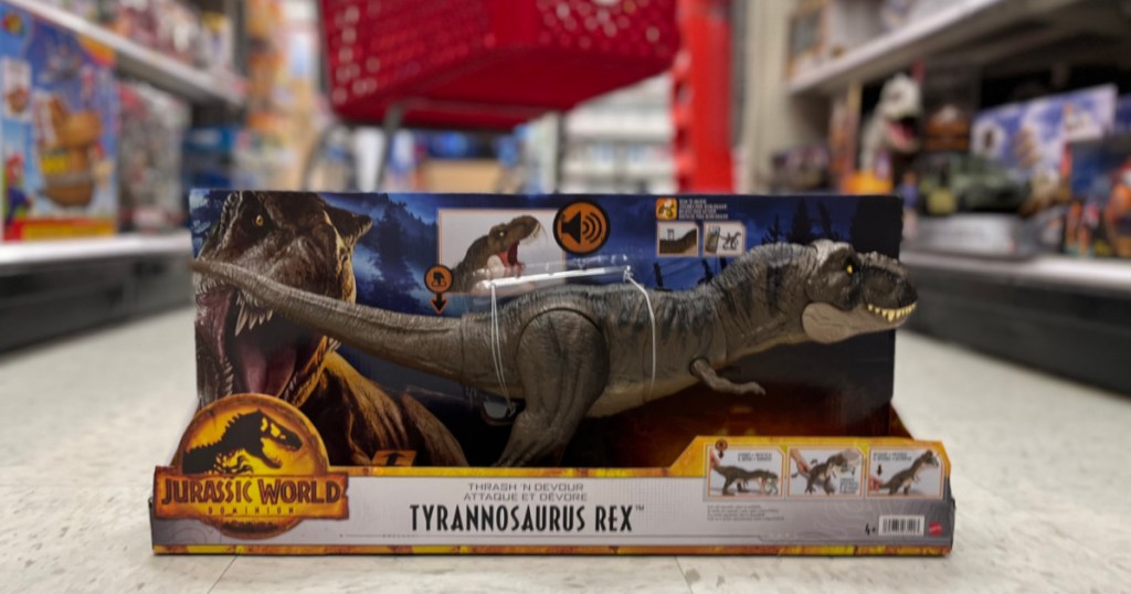 dinosaur toy on floor
