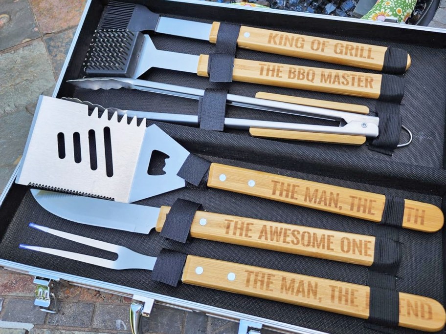 wood-handled grilling tools in a case