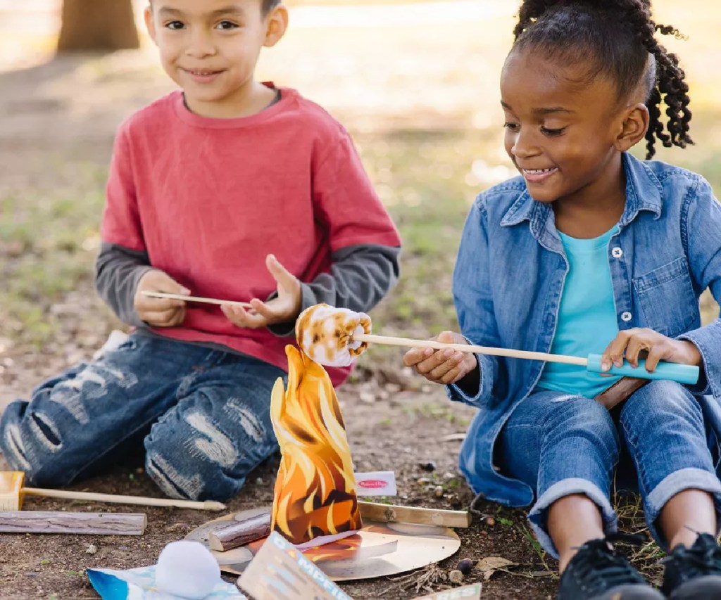 kids playing with a Melissa and Doug Campfire S'Mores Play Set