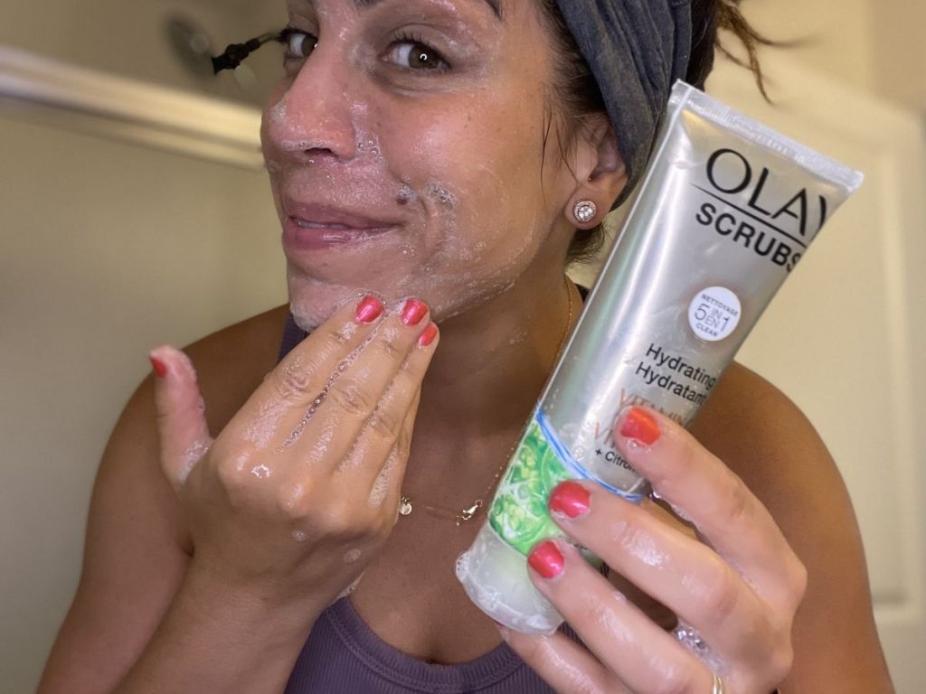 woman using Olay Scrubs on face