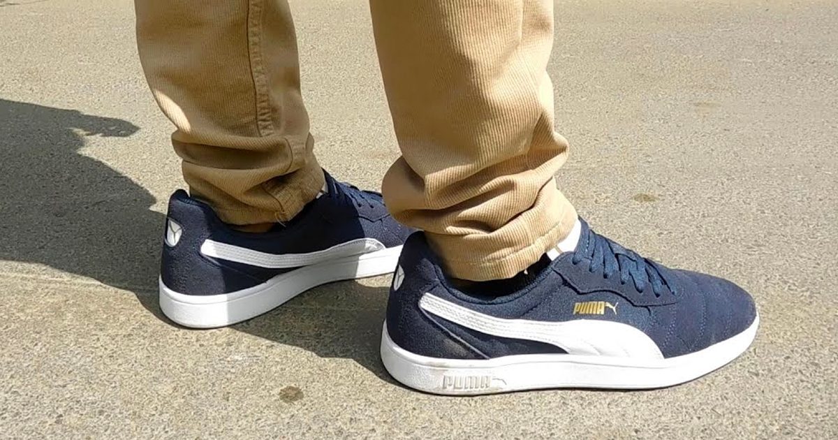 PUMA Men's Astro Kick Sneakers being worn by a man