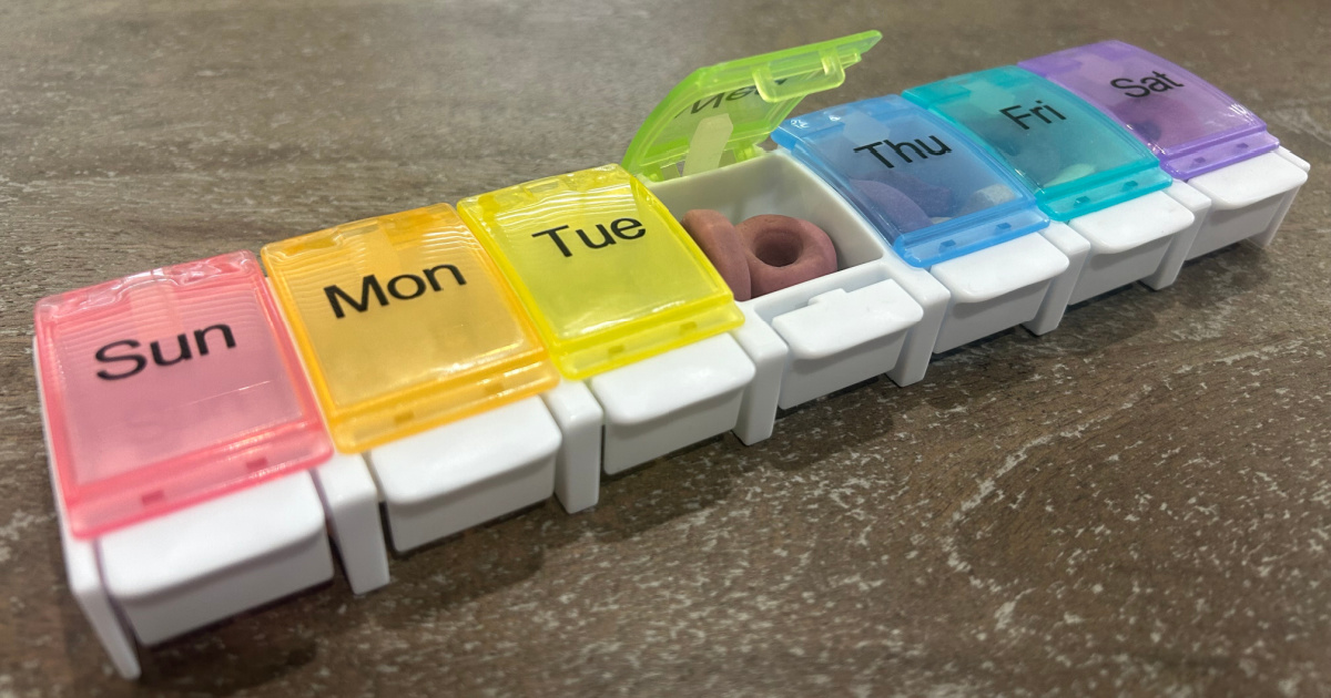Pill Organizer with days of the week and one day opened