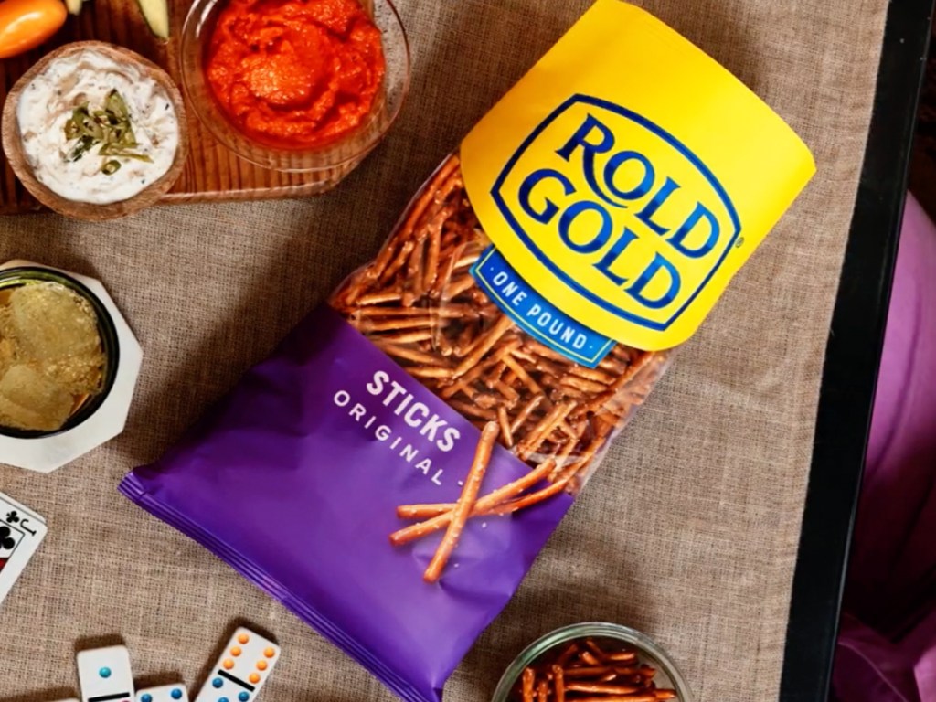 bag of rold gold pretzel sticks on table