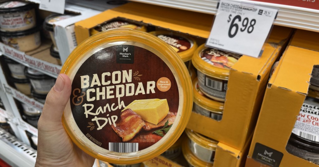 hand holding tub of bacon and cheddar ranch dip in store