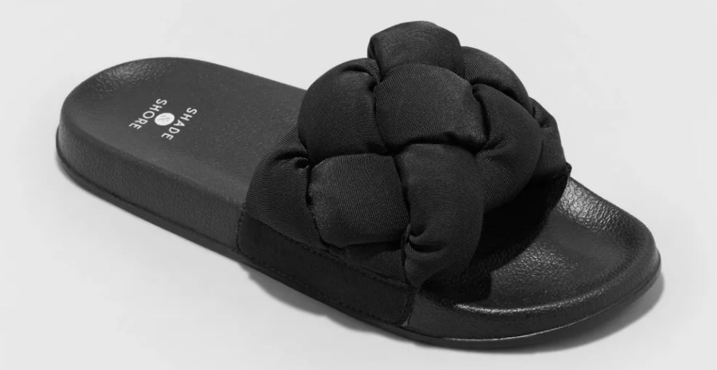 Solid black slide sandal with a braded strap