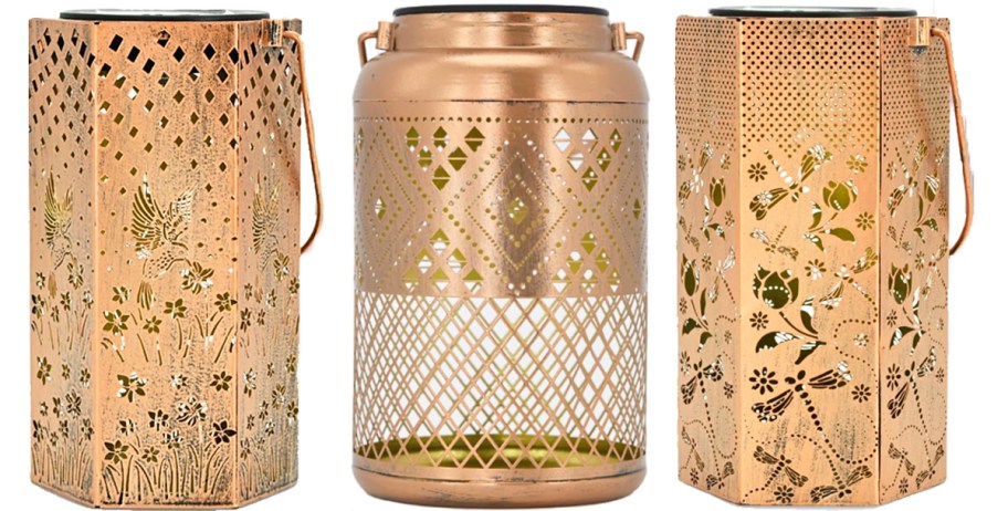 three copper colored solar lanterns