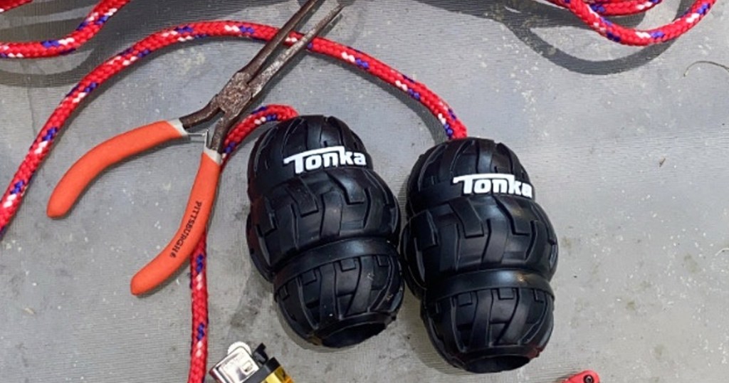 two tonka tire dog toys on rope