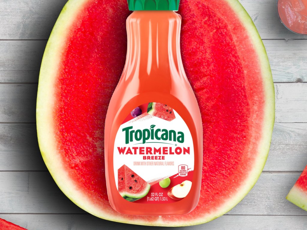bottle of watermelon juice on watermelon