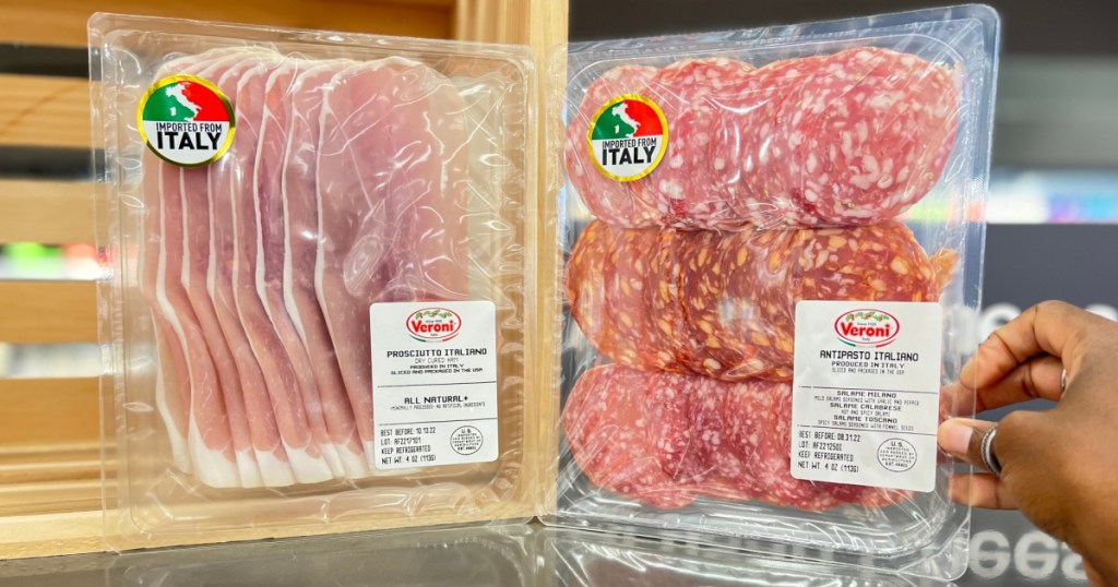 two packages of pre-sliced meats in store