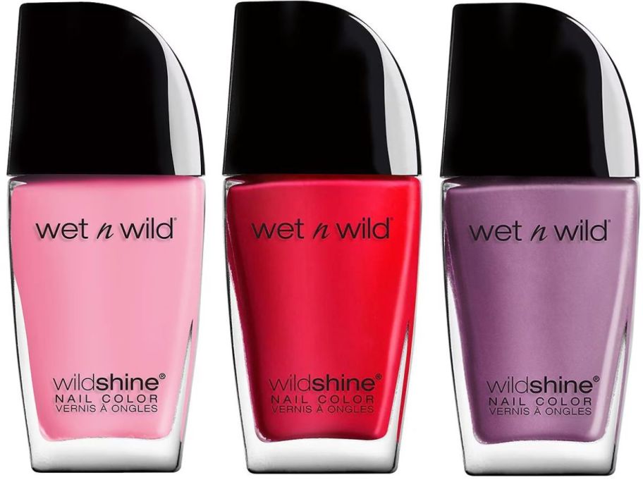 3 bottles of Wet n Wild nail color in pink, red, and purple