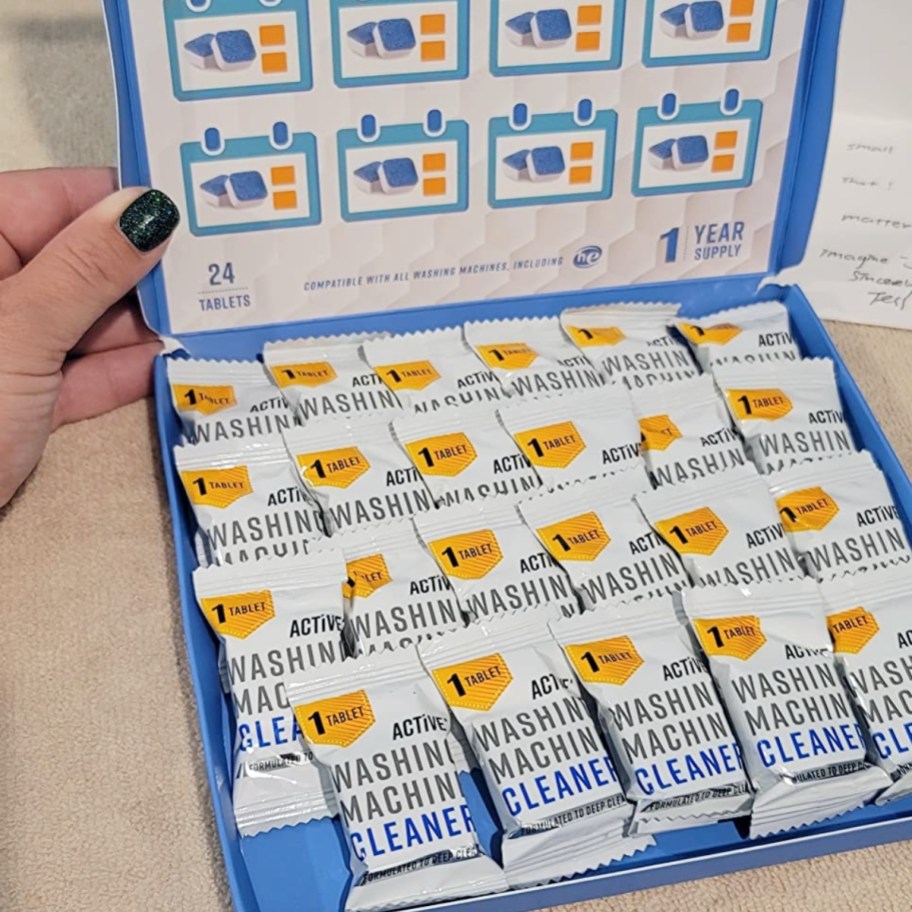 open box full of washing machine-cleaning tablets