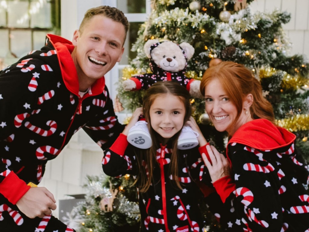 family wearing matching Christmas PJs