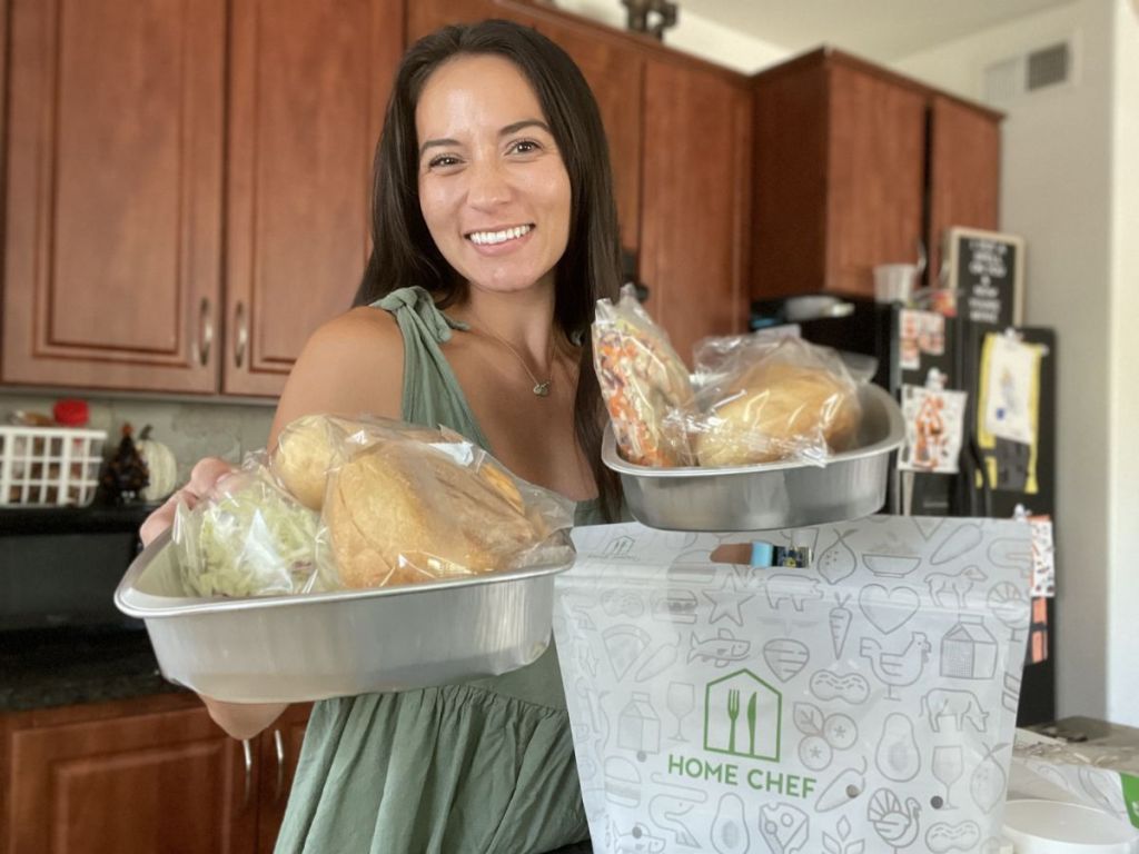 woman holding Home Chef meals