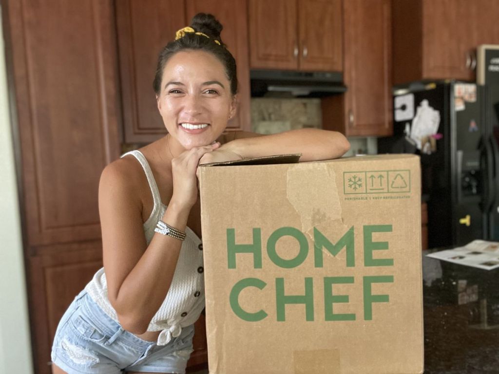 woman with a Home Chef box