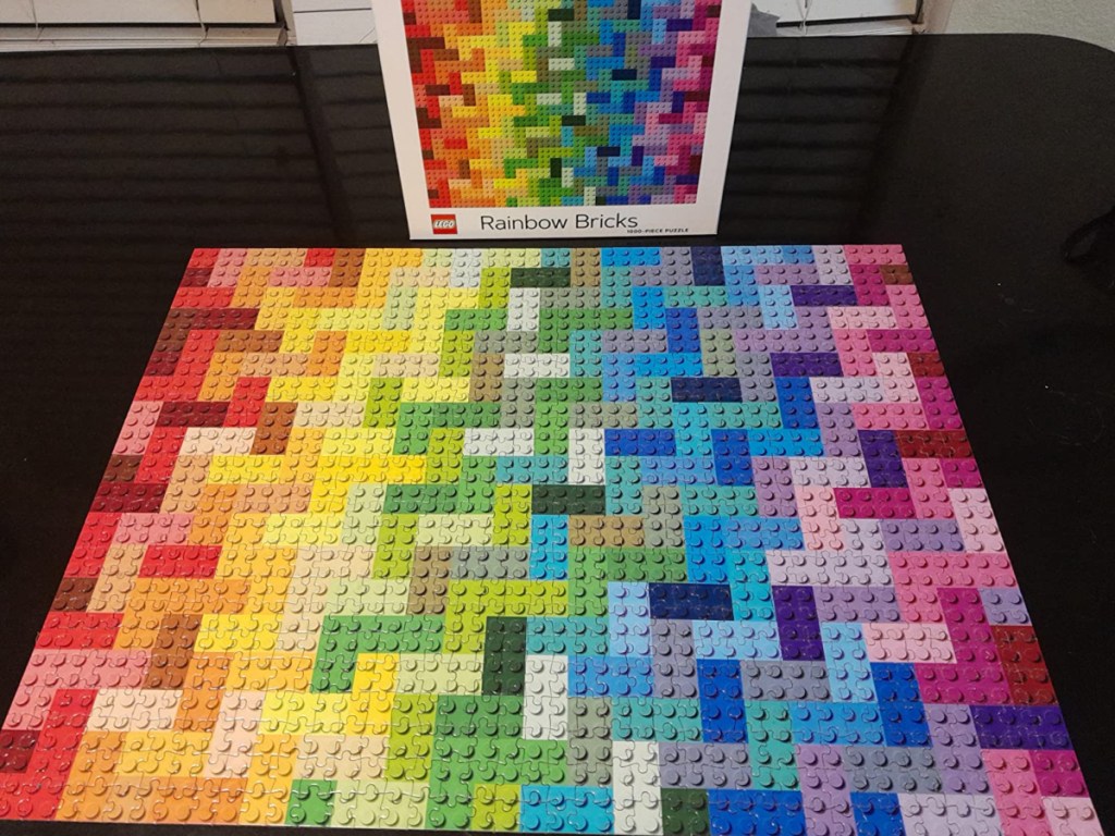 completed lego puzzle next to box
