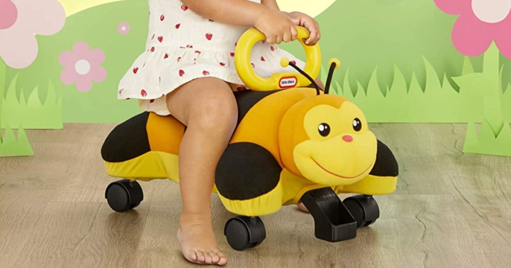 girl on bee toy