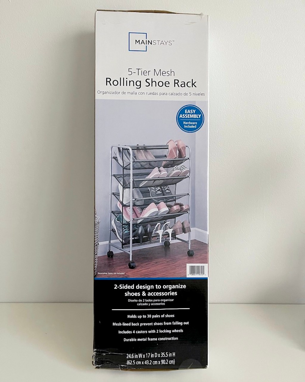 mainstays metal shoe rack in box sitting on white table
