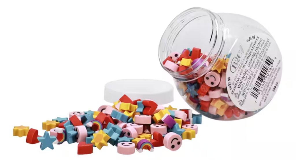 assorted mini erasers coming out of a jar