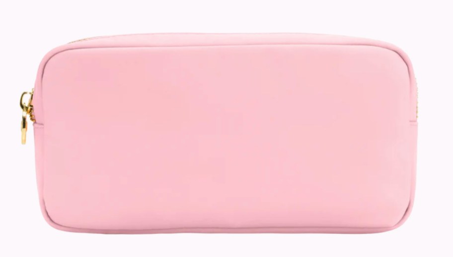 blank pink cosmetic bag on white stock photo background