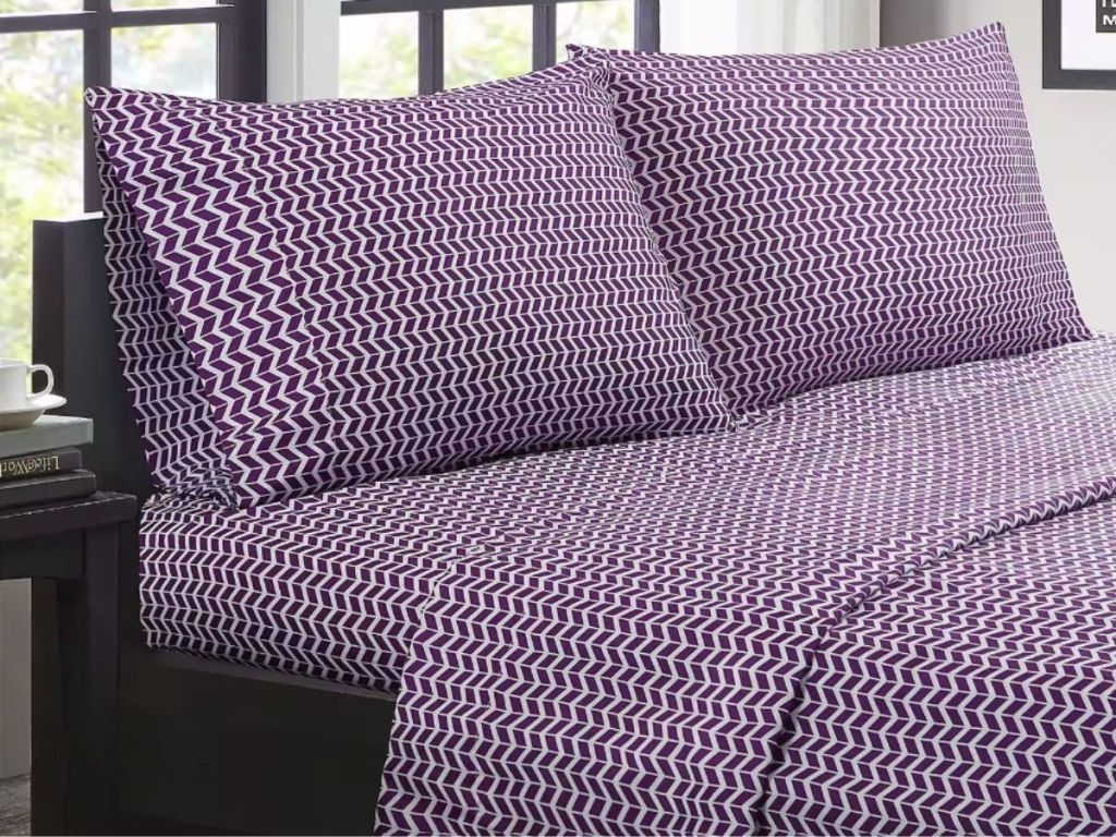 purple chevron sheets on bed