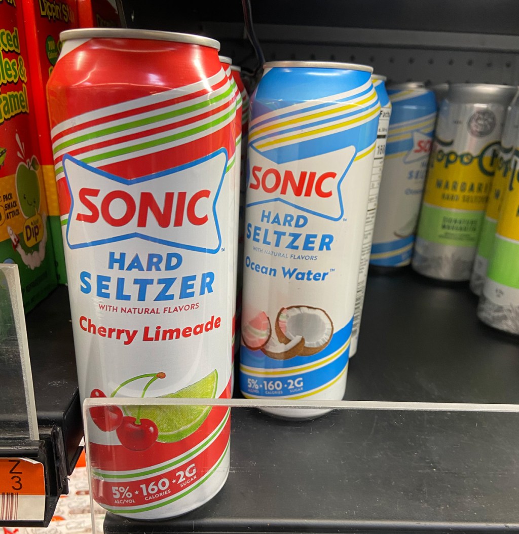 cans of sonic hard seltzers on a walmart store shelf