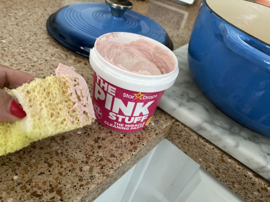 container of The Pink Stuff Miracle Cleaning Paste on counter