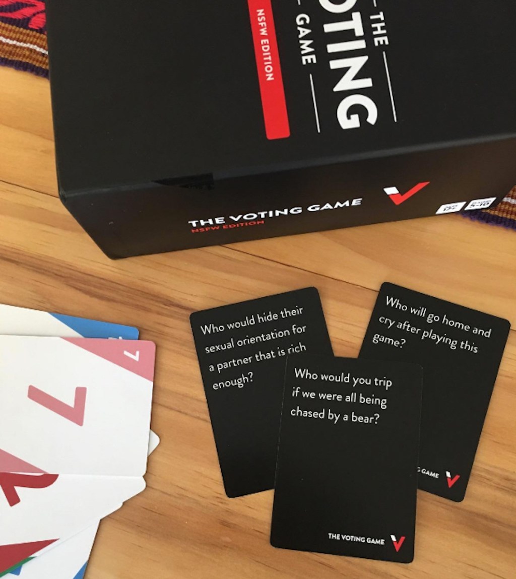 the voting card card after dark edition game spread out on table