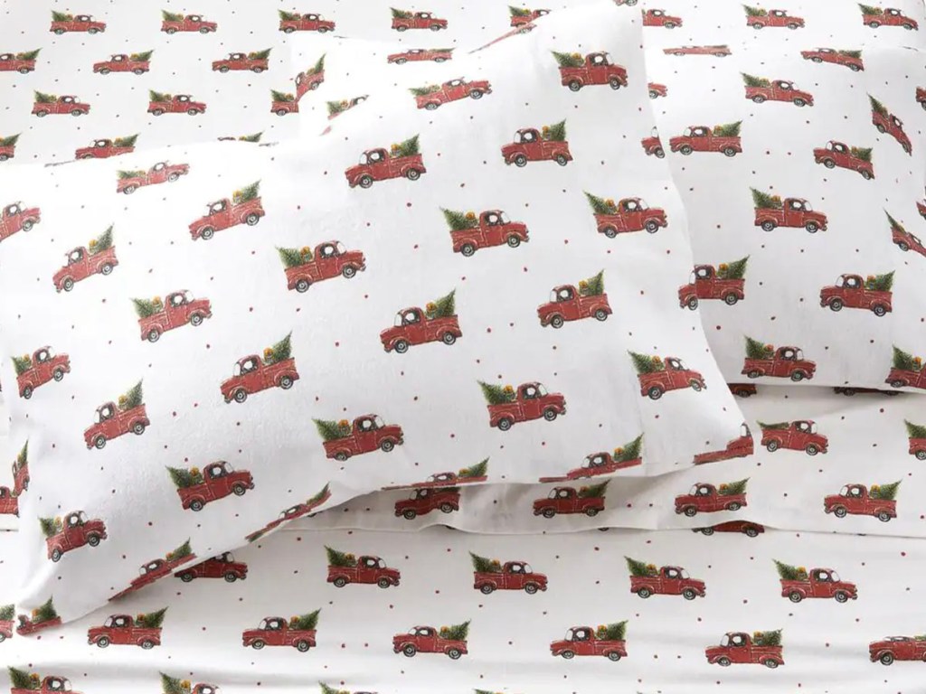 vintage red truck bed sheets on pillow and bed