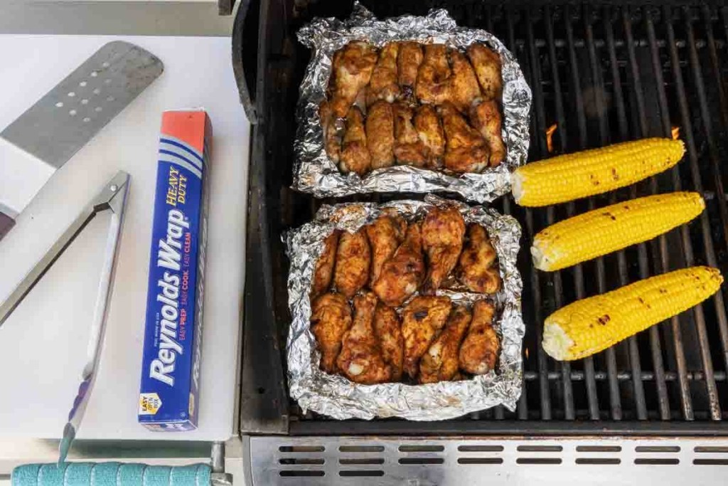 wings and corn on the grill