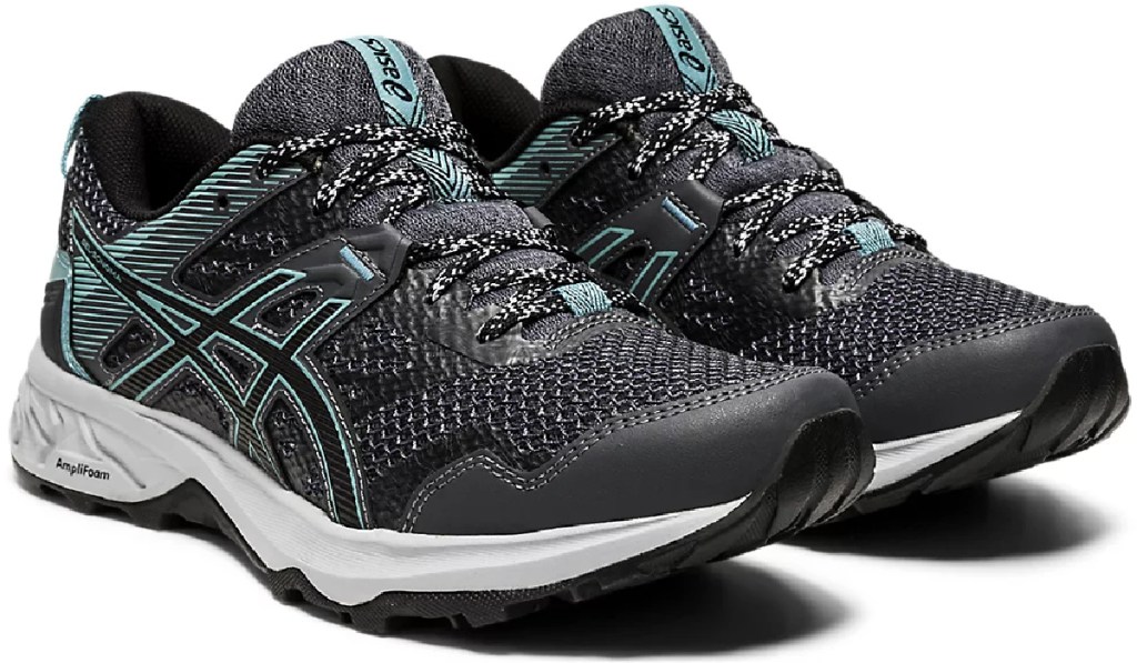 black running shoes with teal details