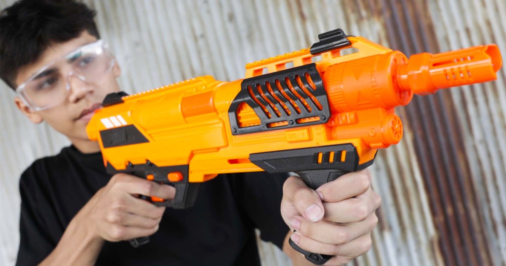 boy holding orange blaster