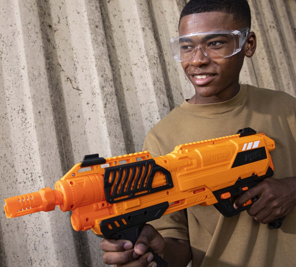 boy holding orange blaster