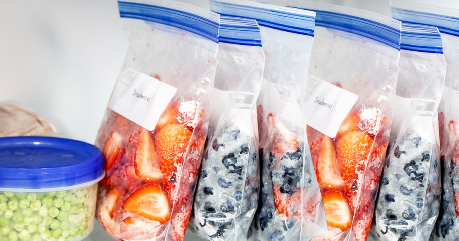 bags full of frozen berries in freezer