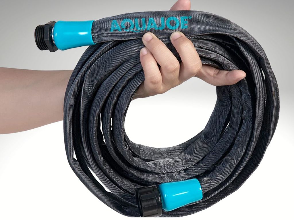 hand holding aquajoe hose