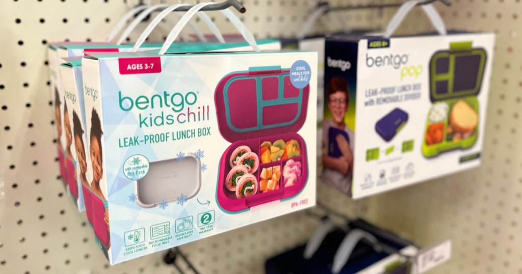 lunch boxes hanging on shelf 