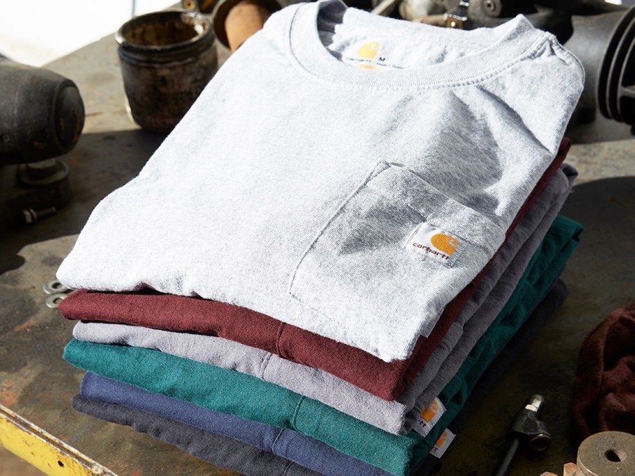 stack of carhartt tees