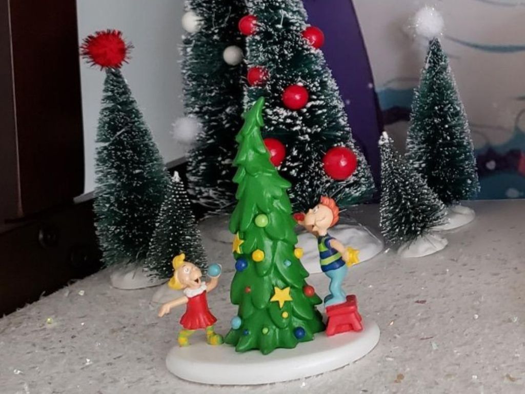 Department 56 Grinch Village figurine of Who. kids with a tree