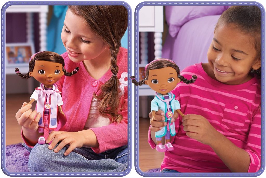 two girls playing with Doc McStuffins dolls
