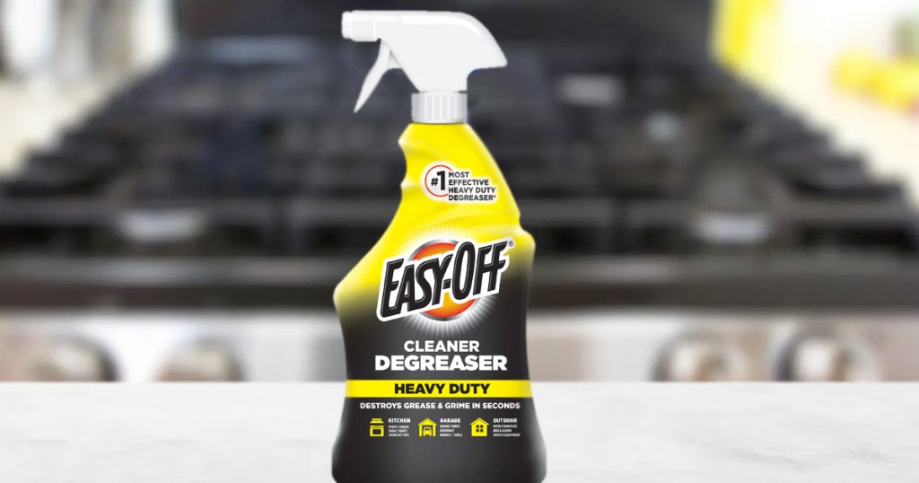 bottle of Easy-Off Heavy Duty Degreaser Cleaner Spray in front of stove