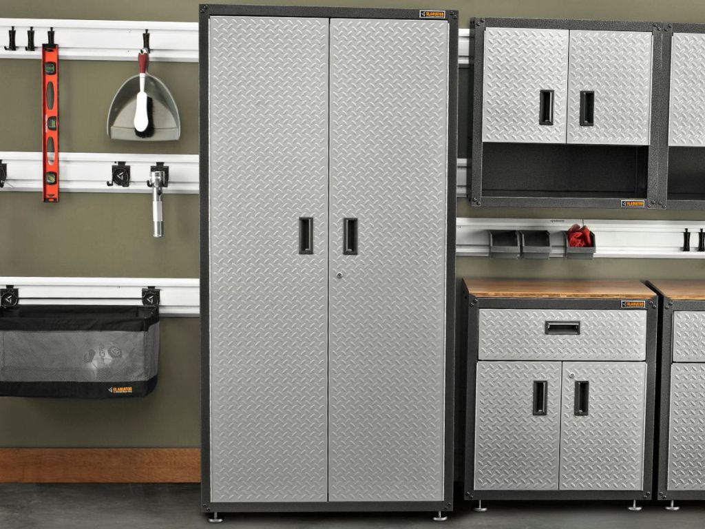 sliver 2-door cabinet with black handles on each door in garage