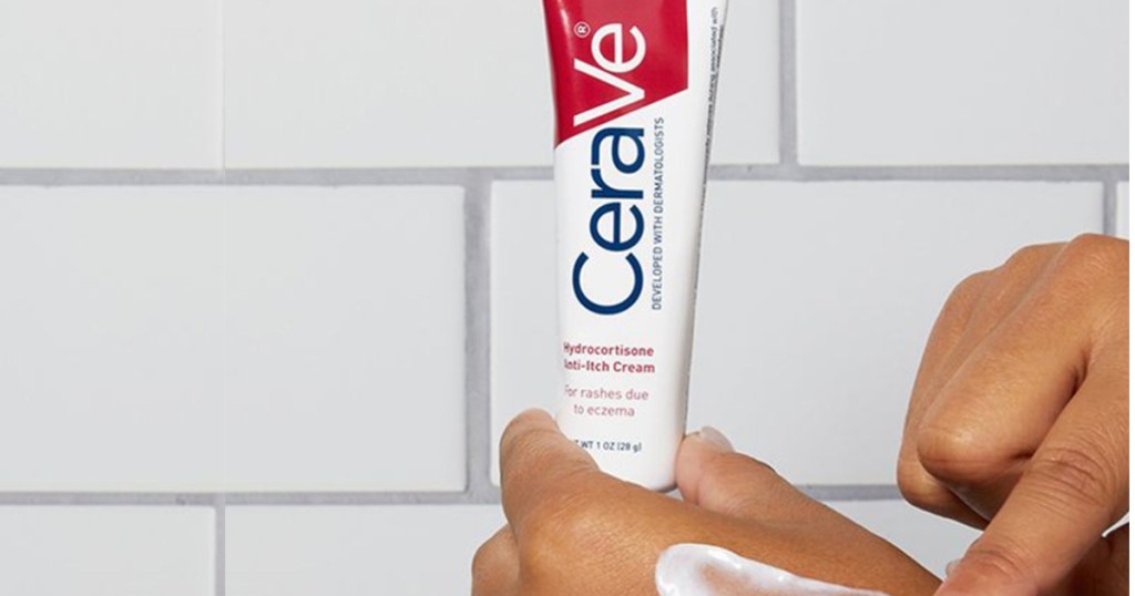 Hand holding CeraVe anti-itch lotion