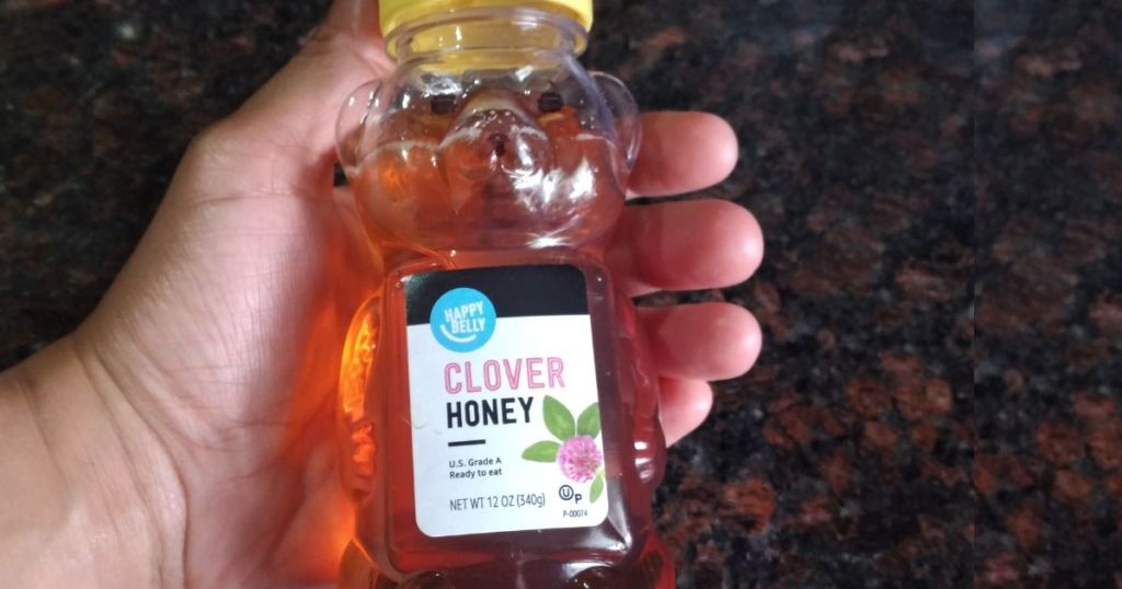 Amazon Happy Belly Clover Honey Bear Jar shown in man's hand