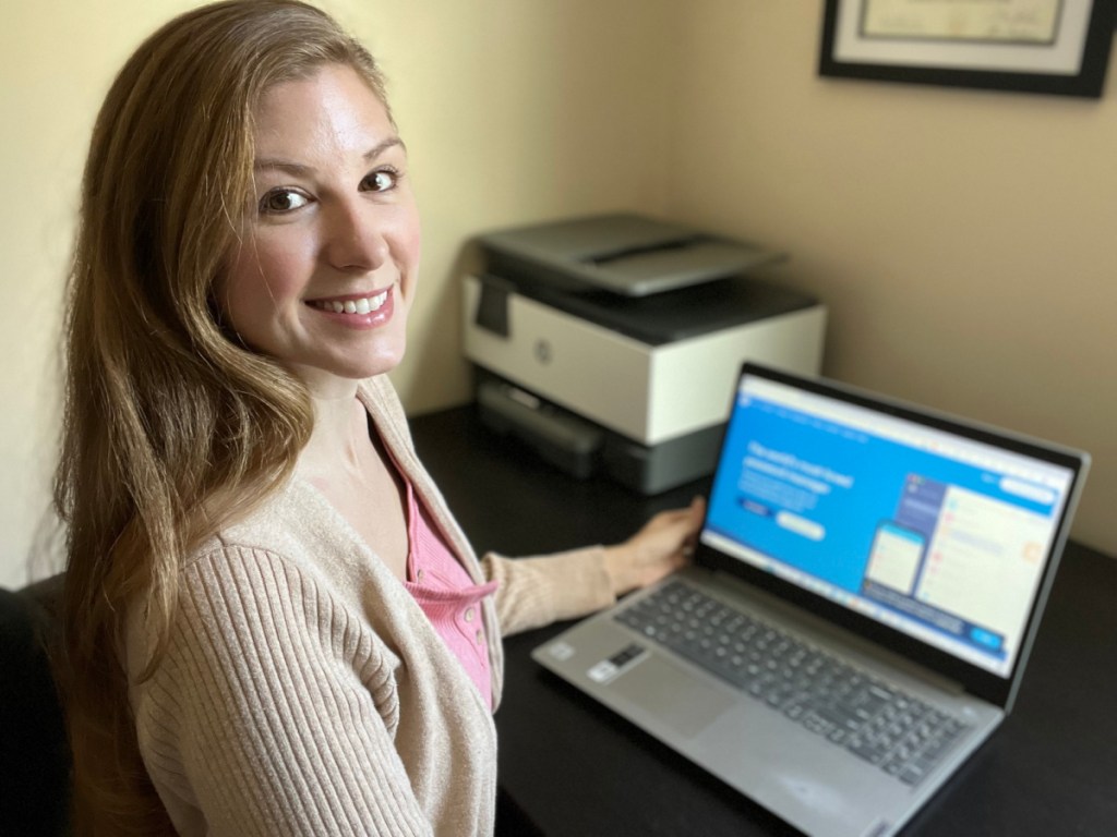 Woman using 1password in home office