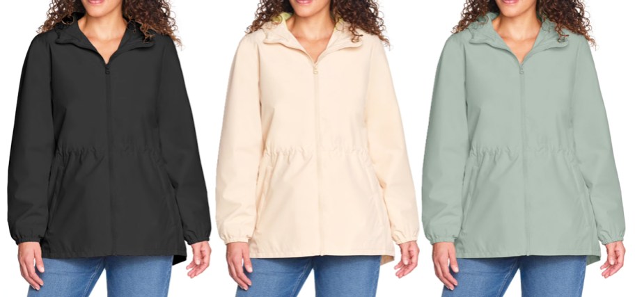 women in black, cream, and green rain jackets