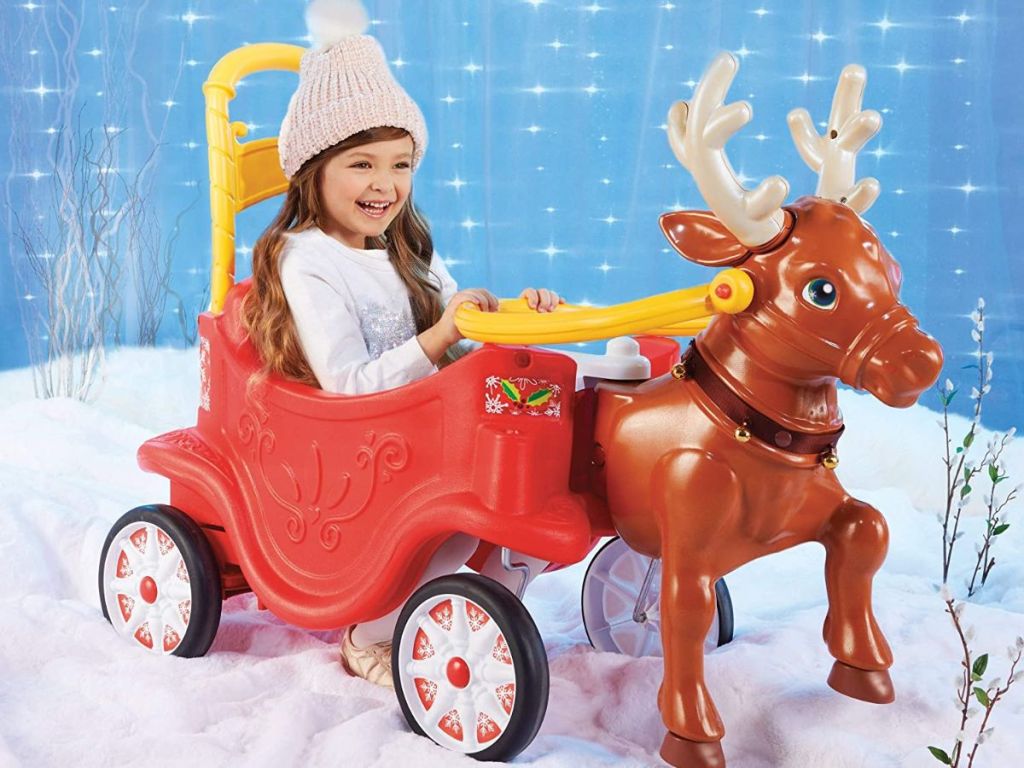 girl riding in Reindeer ride along