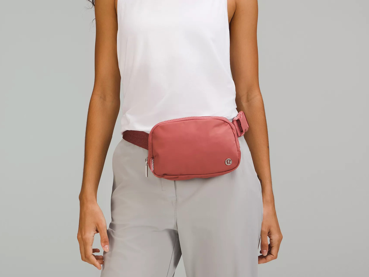 woman wearing Lululemon Belt Bag in pink