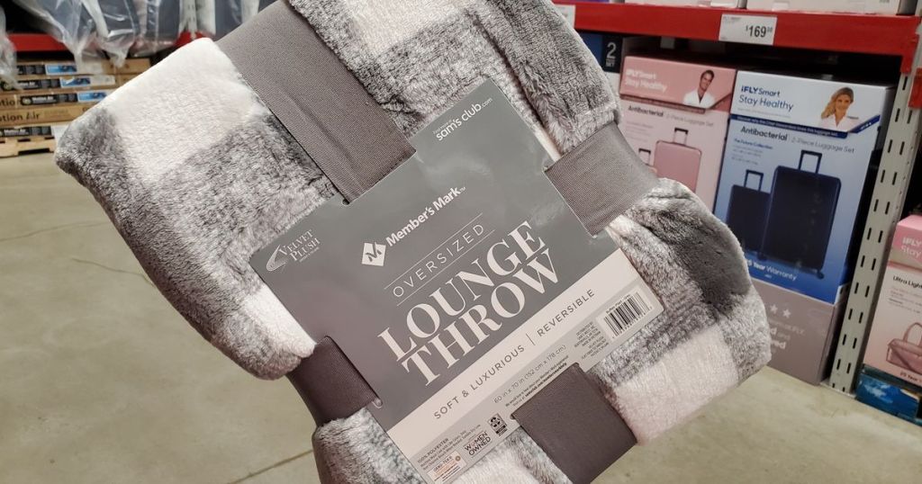 gray and white throw blanket