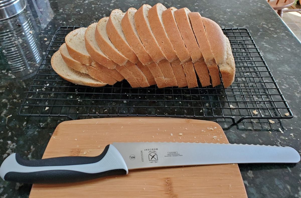 Mercer Bread Knife with sliced loaf of bread